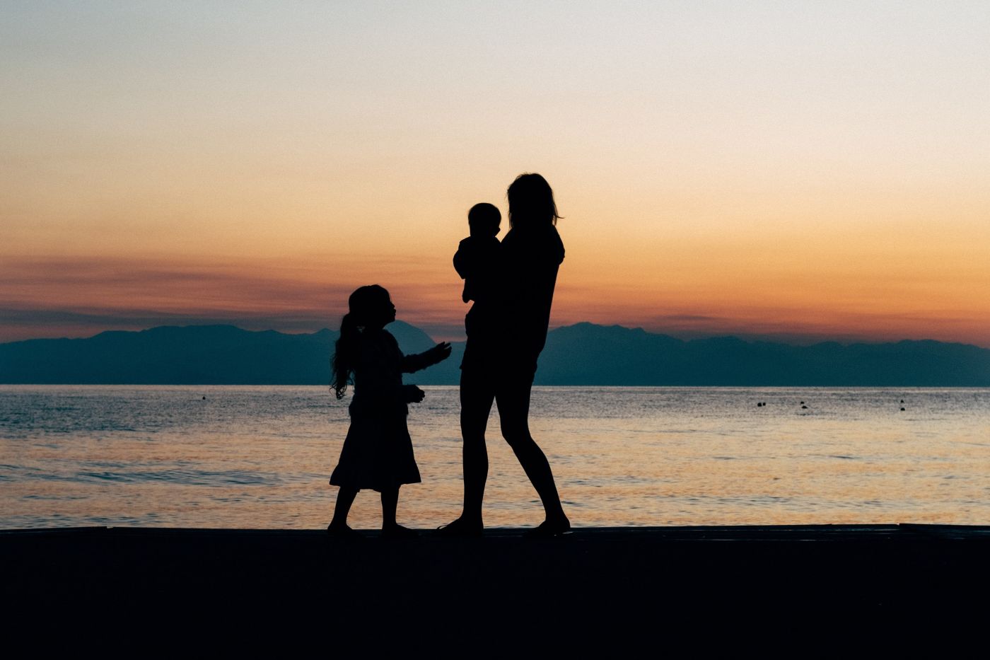 silhouette of family at sundown