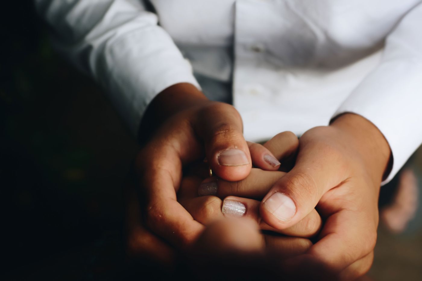 person holding another persons hands